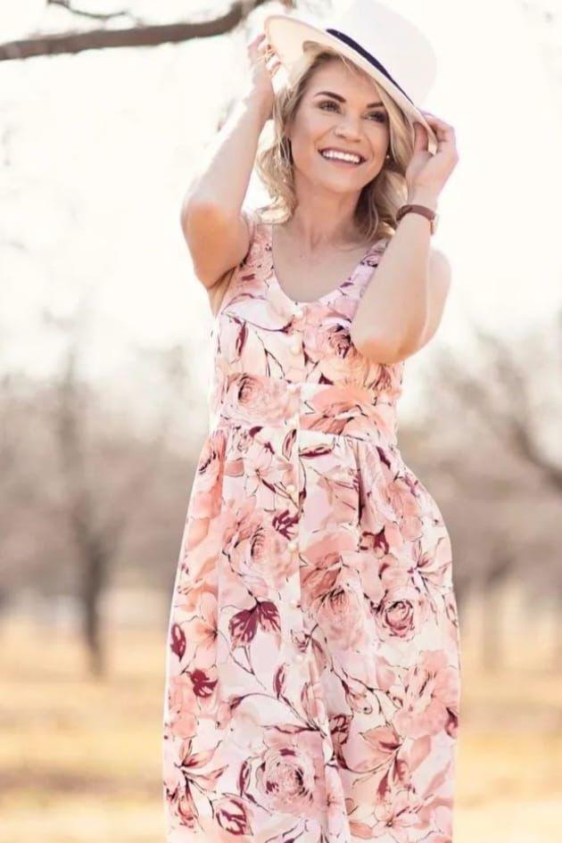 knee length floral dress with pearl buttons in white and dusty pink colour