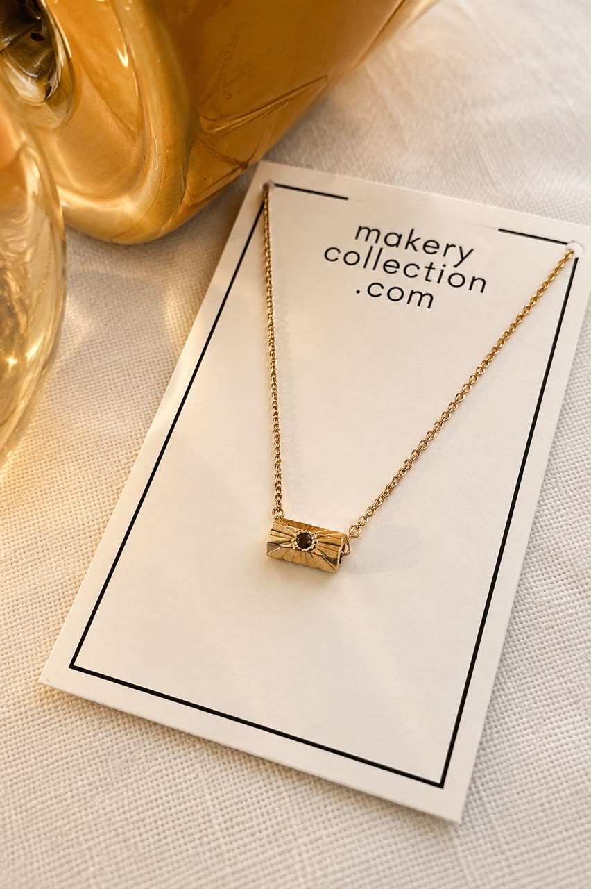 Gold Necklace With Rolling Gold And Lolite Charm