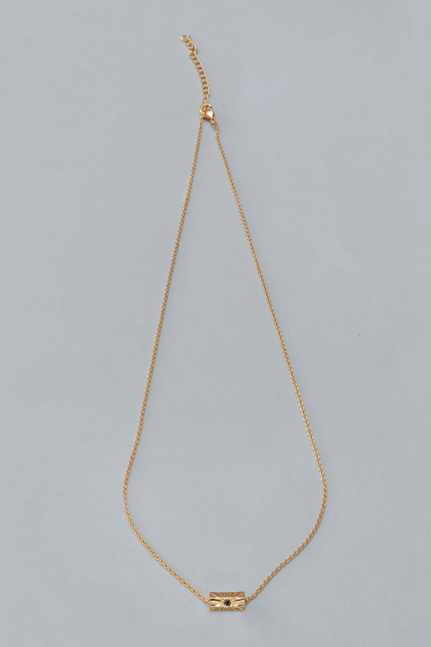 Gold Necklace With Rolling Gold And Lolite Charm