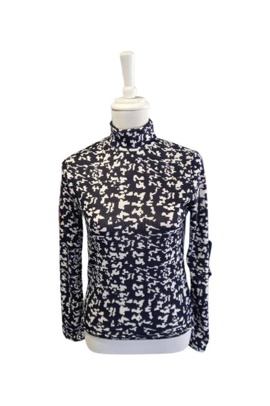 black and white turtleneck with black and white geometric design