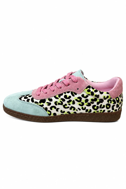 A low-top sneaker featuring a light blue suede toe cap, pink suede overlays and laces, a black leopard print pattern on a white background on the quarter panels, and a pink suede heel tab, set against a plain white background.