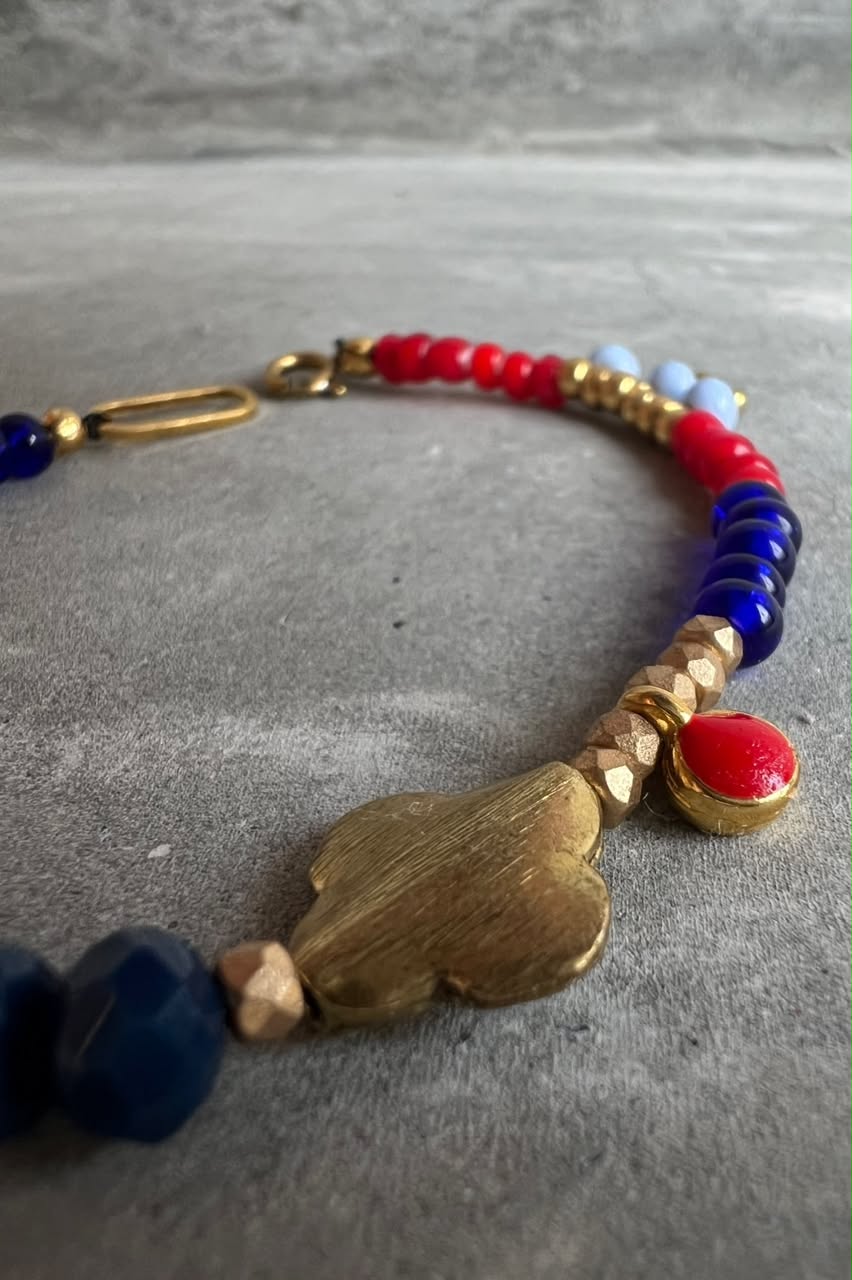 Beaded Navy and Red Bracelet with Brass Flower Bead